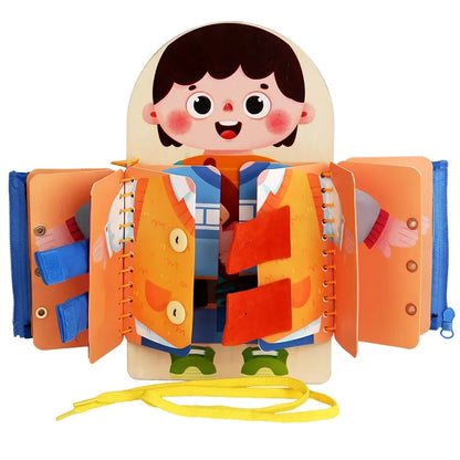 Front view of wooden busy board showing zipper and buckle panels for toddlers