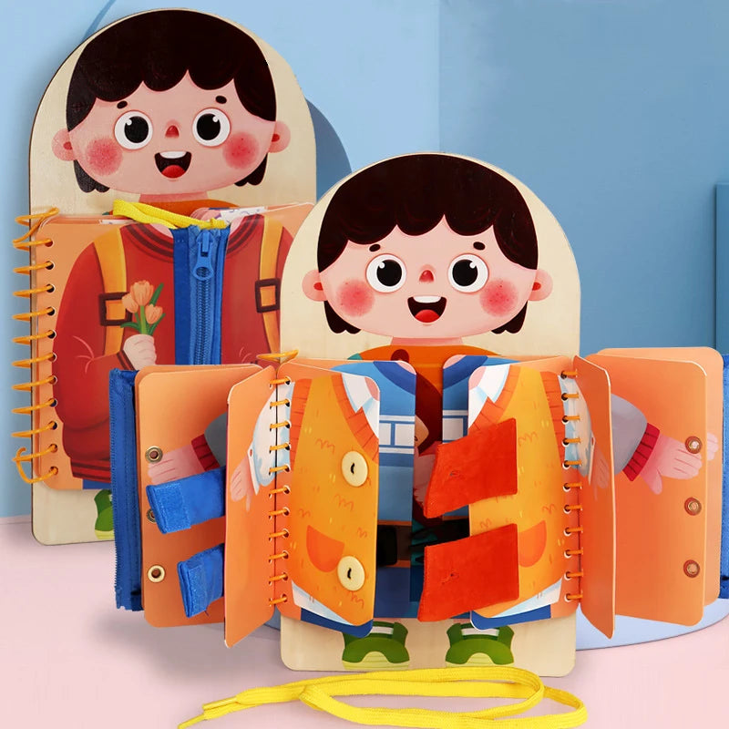 Front view of wooden busy board showing zipper and buckle panels for toddlers